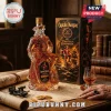 Captain Morgan Pirates of the Caribbean 20th anniversary glass rum bottle with gold liquid on a nautical map table.!