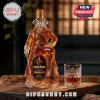 Captain Morgan shaped glass decanter filled with amber rum, accompanied by a matching crystal tumbler on wood table.!