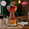 Carolina Hurricanes Stanley Cup champions glass decanter with team logo, smoke, cigar in ashtray, and whiskey glass on table.!