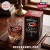 Carolina Hurricanes 2026 NHL Champions whiskey glass and matching box on a leather desk mat with a fountain pen.!
