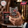 Carolina Hurricanes 2026 NHL Champions whiskey glass with team logo and Stanley Cup graphic held in a hand.!
