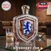 Crystal whiskey decanter featuring a blue Chelsea FC lion crest emblem on a shield-shaped glass bottle.!