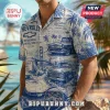 Men’s blue and cream button-down shirt featuring vintage Chevrolet car prints, palm trees, and Golden Gate Bridge graphics.!