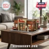 Chick-fil-A brick building model featuring minifigures, stone and brick facade, and a cow mascot on a wooden coffee table.!