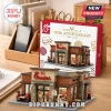 Chick-fil-A 80th anniversary building block construction set on a wooden desk with its red and white retail packaging box.!