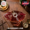 Faceted crystal decanter shaped like a rooster with amber liquid inside, embossed with Chick-fil-A 80th anniversary text.!