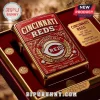Cincinnati Reds Zippo lighter in red and gold finish with team logo, baseball motifs, and ornate engraving in velvet box.!