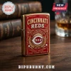 Gold-finish Cincinnati Reds metal lighter with embossed red enamel logo, baseball imagery, and EST 1869 text on wood desk.!
