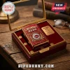 Cincinnati Reds Zippo lighter with ornate gold and red baseball logo in a velvet-lined display box on a wooden desk.!