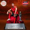 Cristiano Ronaldo in Portugal kit sitting next to UEFA Nations League trophy with a metallic autograph display plaque.!