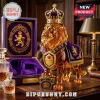 Amber glass lion decanter wearing a gold crown with purple velvet cape, set in a purple box labeled Crown Royal Lion Edition.!