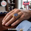 Gold championship ring featuring the Crystal Palace F.C. eagle crest, blue stone, and engraved text on a hand.!
