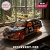 Dale Earnhardt No. 3 Monte Carlo car whiskey decanter with gold chrome finish on a rustic wooden table by a window.!