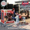 Funko Pop Rides Daniel Suarez vinyl figure holding a Coca-Cola bottle next to a branded display box on a concrete wall.!