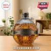 Death Star shaped glass whiskey decanter with gold liquid, imperial emblem stopper, and 50th anniversary plaque details.!