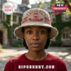 Khaki distressed bucket hat with embroidered Delta Sigma Theta crest, 1913, and Greek letters on a person.!