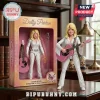 Dolly Parton collectible doll in white rhinestone jumpsuit holding a pink acoustic guitar with box packaging.!