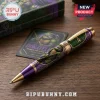 Donatello Teenage Mutant Ninja Turtles metal ballpoint pen with purple and gold accents resting on a wooden surface.!