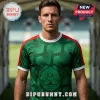 Man wearing a green soccer jersey with red shoulder panels, white trim, and a Bipu Bunny mascot graphic on the chest.!