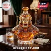 Amber crystal gorilla decanter with diamond-shaped stopper engraved with 1986-2026 40th anniversary on a wooden office desk.!