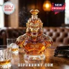 Amber glass decanter shaped like a geometric gorilla bust with diamond-shaped stopper, inscribed with 1986-2026 40th anniversary.!