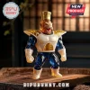 Dragon Ball Z Great Ape Vegeta action figure with a gold crown, wearing white and blue Saiyan armor on a wooden surface.!