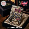 Elton John Zippo lighter with 3D embossed glasses, piano, stars, and text reading Play loud, shine brighter in velvet box.!