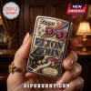 Zippo lighter with embossed Elton John design featuring star-shaped sunglasses, piano keys, and musical notes in gold.!