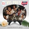 Oval ceramic decorative plate featuring Elvis Presley Aloha From Hawaii concert imagery on a black display stand.!