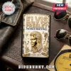 Elvis Presley metal lighter with gold relief portrait, rhinestone embellishments, and black border on leather background.!