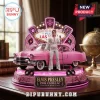 Elvis Presley figurine in white jumpsuit standing by a pink Cadillac on a lighted Las Vegas themed display base.!