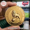 Gold-colored English Premier League 35th Anniversary commemorative coin held in fingers with a lion icon and soccer ball.!