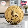 Gold-toned English Premier League commemorative coin with an embossed lion wearing a crown on a marble surface.!