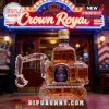 Crown Royal whiskey glass decanter shaped like a yellow construction excavator on a neon-lit bar background.!