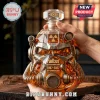 Fallout T-60 power armor helmet whiskey decanter made of faceted glass filled with amber liquid on a wooden surface.!