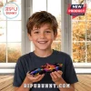 Young boy smiling while holding a colorful tie-dye patterned die-cast IndyCar race car toy.!