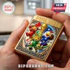 Gold Zippo lighter featuring embossed 3D FIFA 2026 World Cup graphics, mascots, and a soccer trophy on a metallic background.!