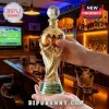 Gold-plated FIFA World Cup 2026 liquor decanter with soccer ball stopper, resting on a wooden bar counter.!