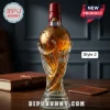 2026 FIFA World Cup glass trophy whiskey decanter with a globe stopper, red wax seal, and base text on a wooden desk.!