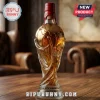 2026 FIFA World Cup glass trophy whiskey decanter with a red wax-sealed cork stopper on a wooden table.!