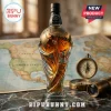Glass whiskey bottle shaped like the 2026 FIFA World Cup trophy with Jack Daniel's branding, set on a map with a compass.!