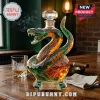 Faceted glass snake whiskey decanter with FAMU etching, crystal topper, and base plate reading Strike, and Strike Again.!