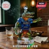 Faceted crystal alligator whiskey decanter wearing a blue jersey with text 1906-2026 120th anniversary and Only Gators.!