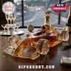 Formula 1 race car shaped glass decanter filled with amber whiskey and topped with a metallic horse figurine stopper.!
