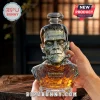 Frankenstein 95th Anniversary glass decanter in the shape of a monster head with amber liquid and metal screw cap.!