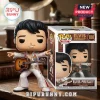 Elvis Presley Funko Pop Rock vinyl figure wearing a white sequined jumpsuit and holding an acoustic guitar next to its box.!
