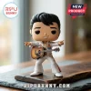 Elvis Presley vinyl figure wearing white rhinestone jumpsuit and holding an acoustic guitar on a wooden display board.!