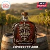 Decorative glass whiskey bottle with ornate gold emblem, engraved text Fuck Your Feelings and Generation X on a barrel.!
