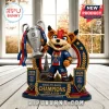 PSG brick-built mascot holding a silver Champions League trophy with Eiffel Tower backdrop on a wooden table.!