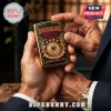 Gold metal flip-top lighter featuring Germany football emblem, black and red enamel, and text DEUTSCHLAND DIE MANNSCHAFT.!
